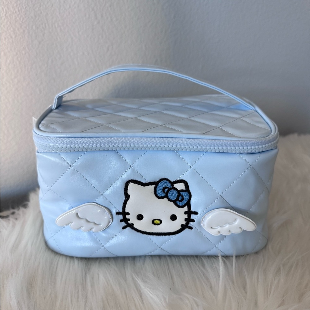 NWT Hello Kitty Light Blue Quilted Cosmetic Bag with Wings